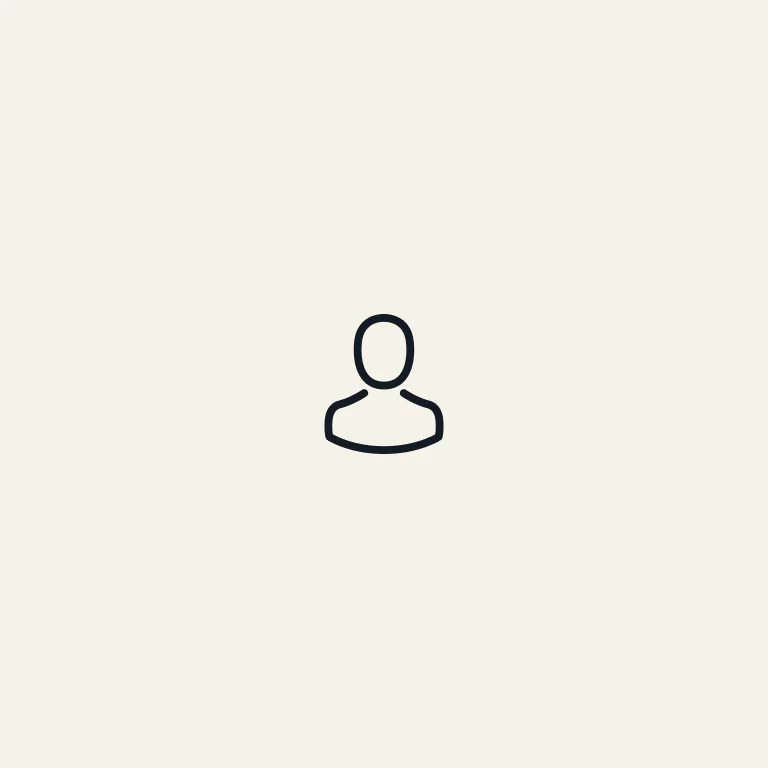 A simple black outline of a person’s bust, resembling a user or profile icon, centered on a plain light beige background.