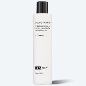 A white bottle of PCA Skin Creamy Cleanser for normal to dry skin, hydrates and removes impurities. Pairs well with the Detoxifying Mask. Comes in a 7 fl oz (207 mL) size with a black cap.