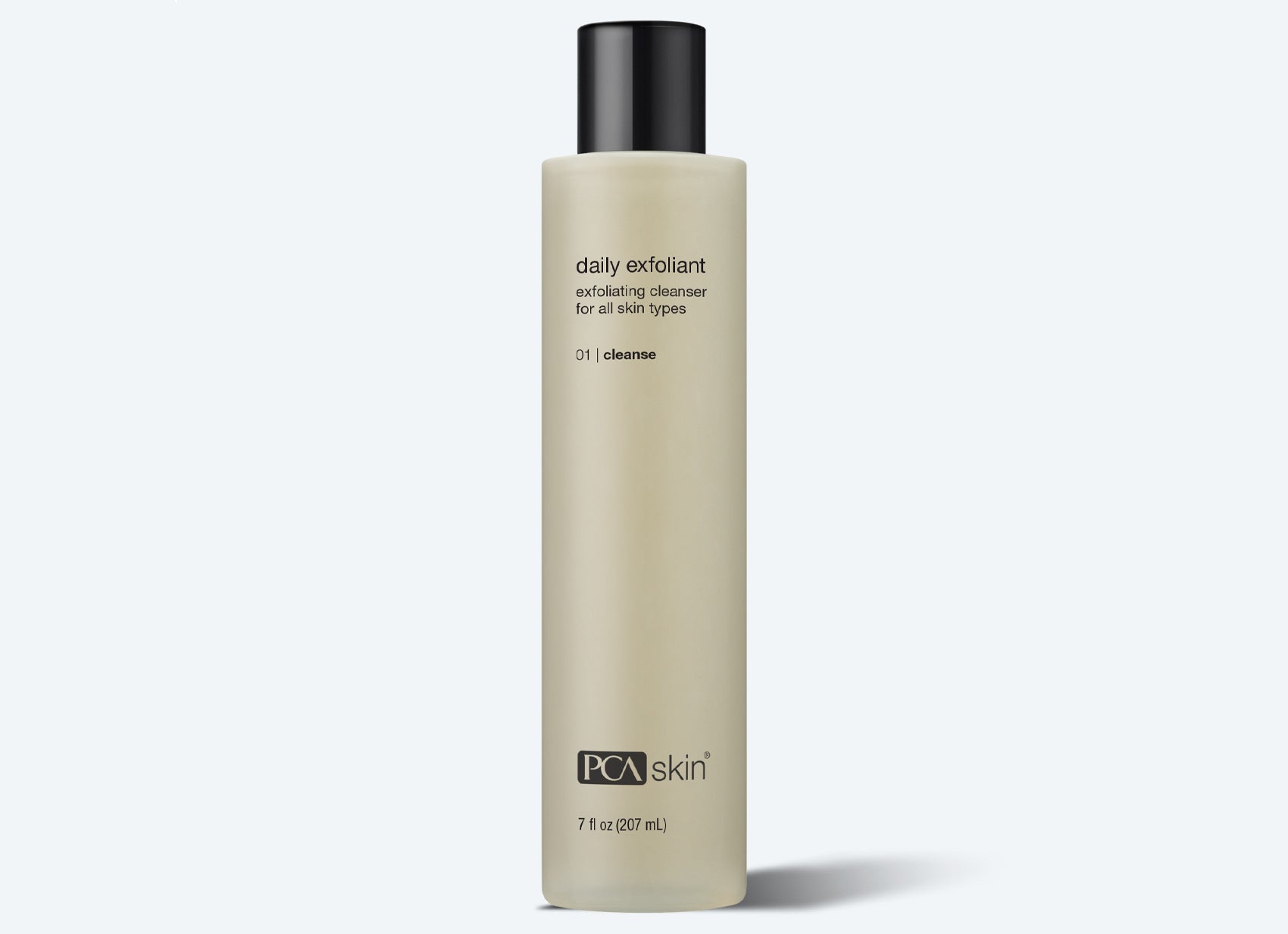 A tall, cylindrical bottle of cleanser with a black cap and beige label—PCA Skin Daily Exfoliant—pairs perfectly with the Detoxifying Mask for a refreshed skincare routine.