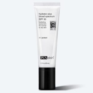 A white tube of PCA Skin Hydrator Plus Broad Spectrum SPF 30, a hydrating sunscreen for normal to dry skin, stands upright on a light gray background—ideal for use after your Detoxifying Mask.