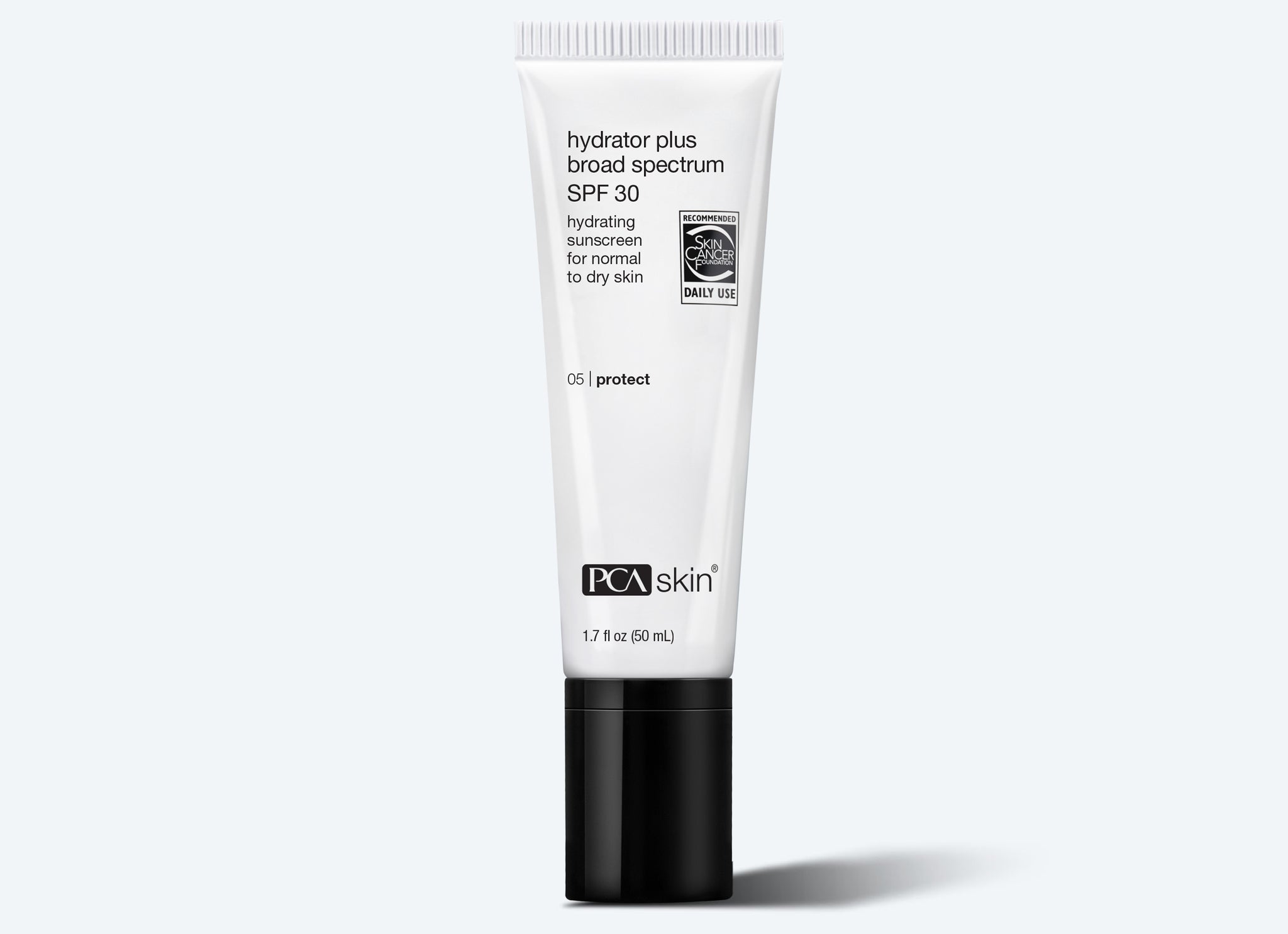 A white tube of PCA Skin Hydrator Plus Broad Spectrum SPF 30, a hydrating sunscreen for normal to dry skin, stands upright on a light gray background—ideal for use after your Detoxifying Mask.