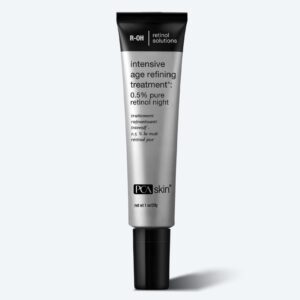 A silver PCA Skin tube labeled "intensive age refining treatment: 0.5% pure retinol night" offers nighttime anti-aging care. For a complete evening routine, pair it with the Detoxifying Mask. The tube features black/white text and a black cap.
