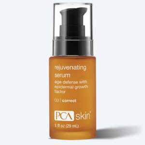 A bottle of PCA Skin Rejuvenating Serum with a black pump dispenser and amber label pairs perfectly with your Detoxifying Mask routine for age defense and epidermal growth factor benefits. 1 fl oz (29 mL).