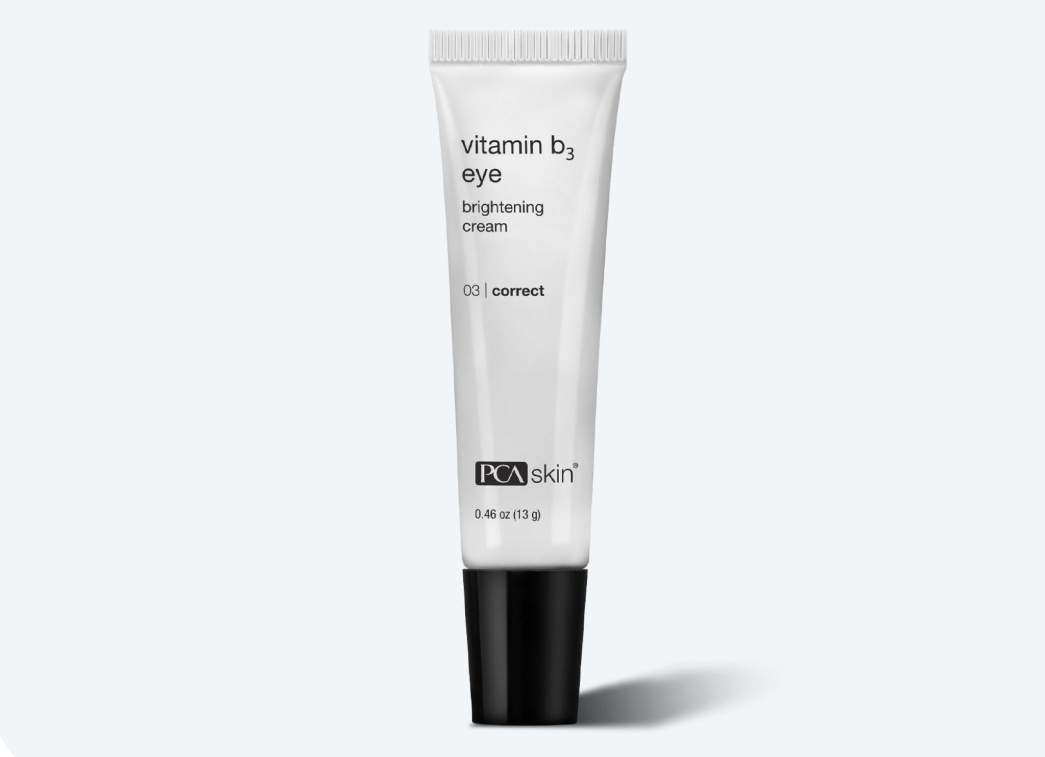 A white tube of Detoxifying Mask by PCA Skin with a black cap stands upright against a light gray background. The sleek label displays product details and the net weight of 0.46 oz (13 g).